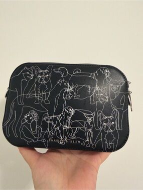 Charles & Keith Black Toiletry Pouch with White Dog Line Art